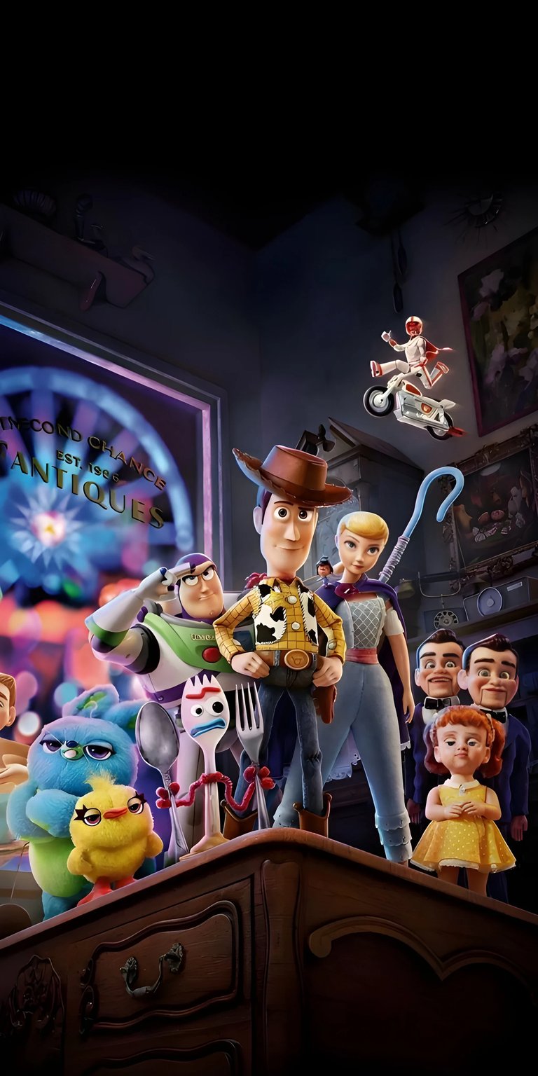 Get this Toy Story 4K wallpaper for your iPhone, featuring Woody, Buzz Lightyear, Bo Peep, and more from the classic movie. The wallpaper shows a group of toys in an antique store with a vintage motorcycle toy flying overhead.