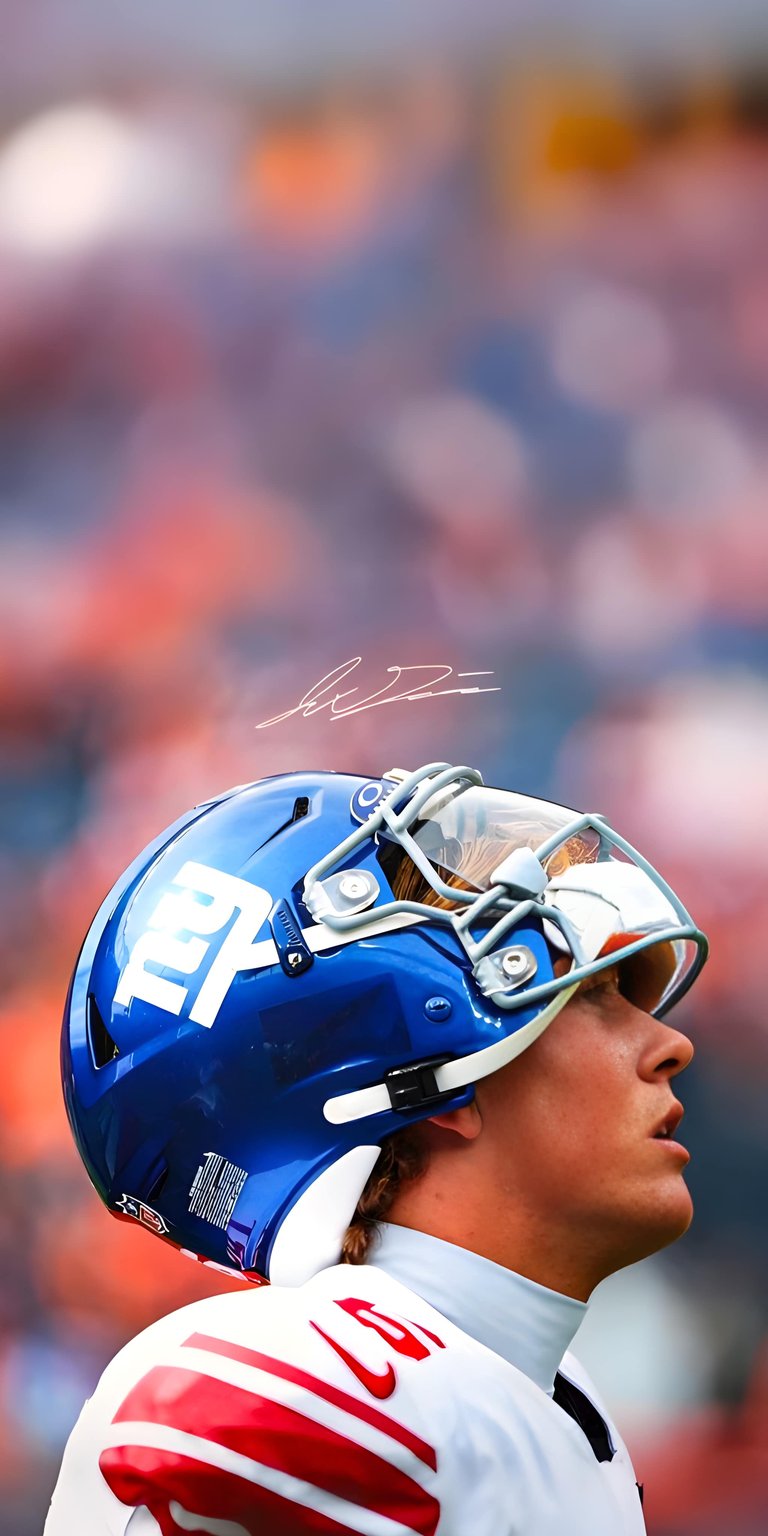 This stunning Daniel Jones 4K wallpaper features the Giants quarterback in his classic blue helmet during a game. Elevate your iPhone screen with this high-resolution sports wallpaper showing professional football action in crisp detail.