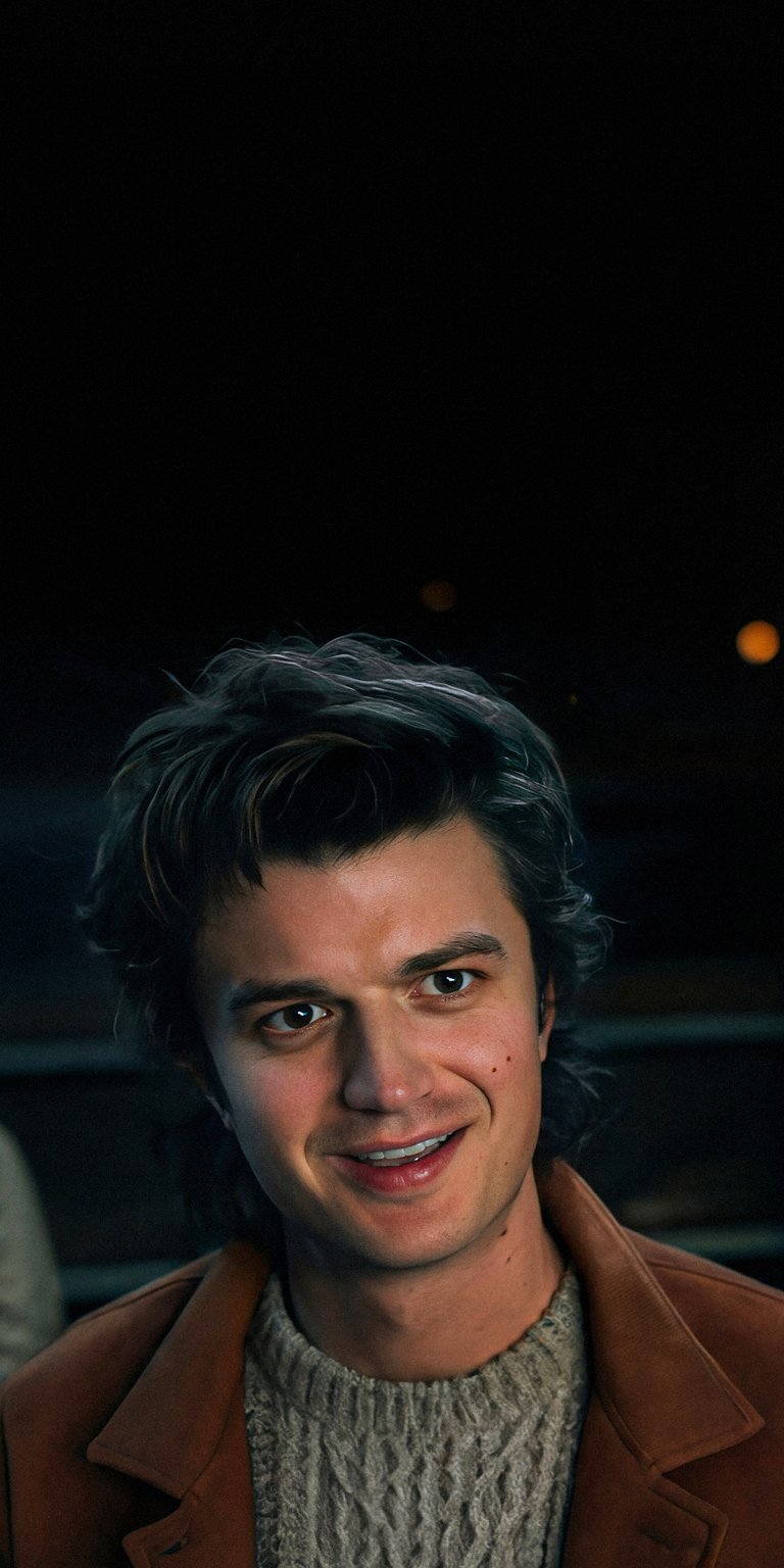 Get this 4K wallpaper of Steve Harrington for your iPhone! Featuring Steve's signature hair, a cozy cable knit sweater, and a genuine smile, this wallpaper is perfect for any fan.