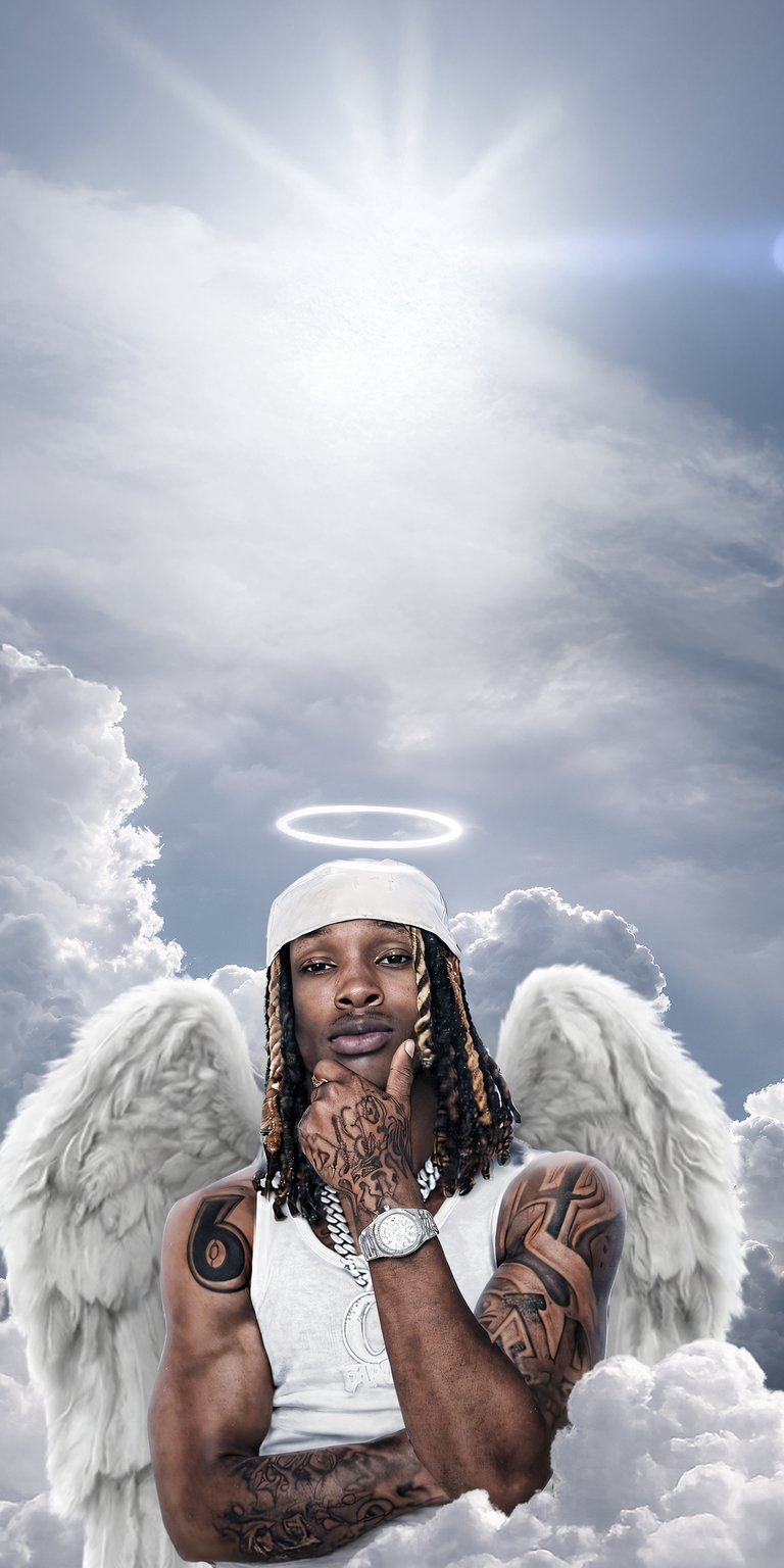 This 4K Aesthetic wallpapers design serves as a memorial for King Von on your iPhone. The wallpaper features heavenly white clouds, angel wings, and bright ethereal lighting.