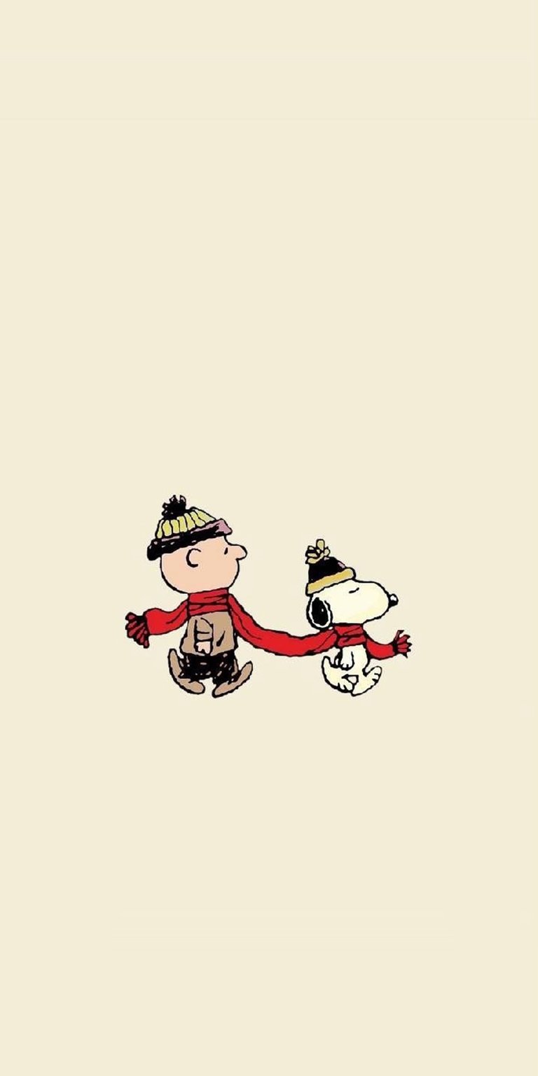 Download this Charlie Brown and Snoopy 4K wallpaper for your iPhone, featuring the iconic duo holding a red scarf and wearing winter hats. This adorable wallpaper showcases the heartwarming friendship between Charlie Brown and Snoopy.