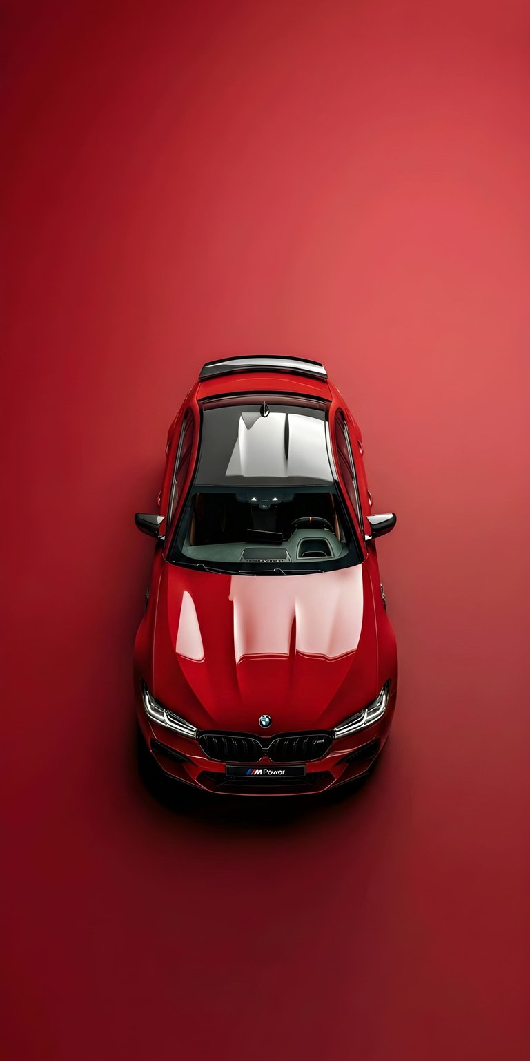 This Red BMW M5 Competition 4K wallpaper features a high-contrast top-down view perfect for your iPhone Lock Screen. The deep red tones and dark accents make it an ideal choice for users seeking premium OLED / AMOLED wallpapers with a clean, automotive aesthetic.
