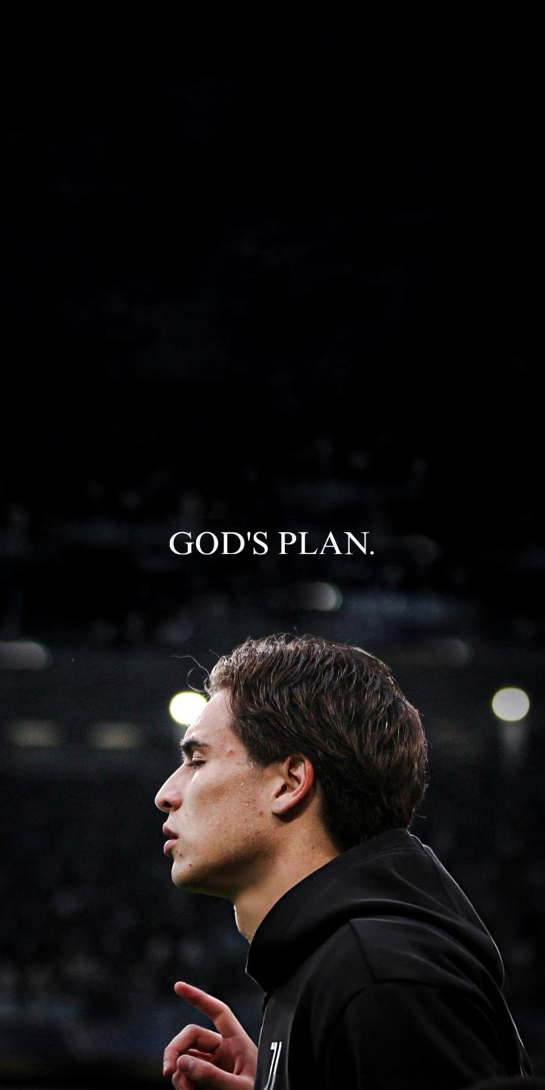 Juventus forward Kenan Yildiz in his blue training kit with "GOD'S PLAN" centered above. This sports wallpaper features moody lighting and a focused athletic aesthetic for your iPhone.