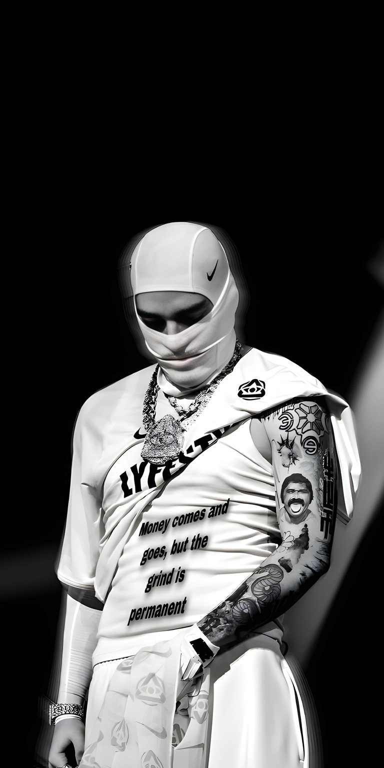 This black and white wallpaper features a gritty portrait of rapper Yeat in a mask. It is an edgy aesthetic wallpapers choice that brings an urban, high-contrast look to your iPhone.