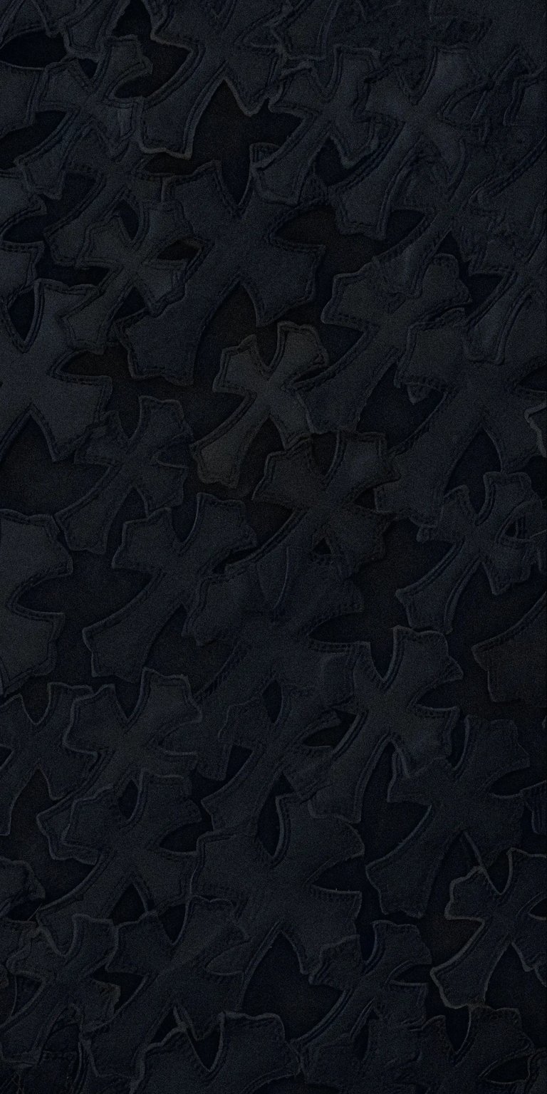 Elevate your iPhone with this Chrome Hearts 4K wallpaper, showcasing a dense field of outlined crosses. The monochromatic color scheme and soft shadows add depth to this striking wallpaper.