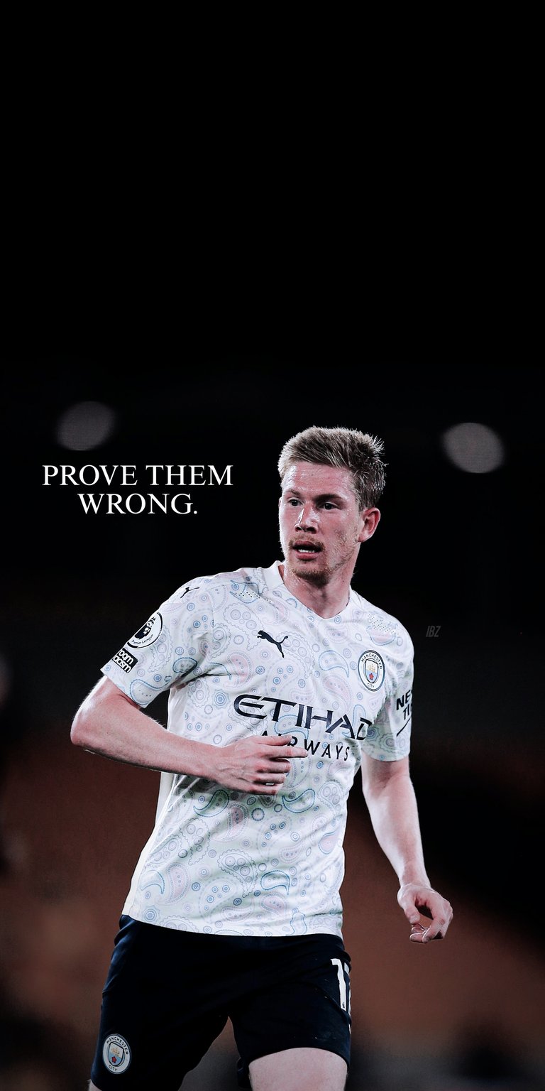 Kevin De Bruyne is captured mid-action in this dynamic sports wallpaper designed for iPhone. The "Prove Them Wrong" text adds a motivational layer to this high-quality aesthetic wallpaper.