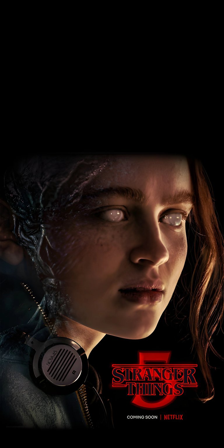 Get this high-quality wallpaper of Max from Stranger Things in 4K for your iPhone! Notice her milky eyes and the strange vines creeping up her face, all captured in this stunning wallpaper.