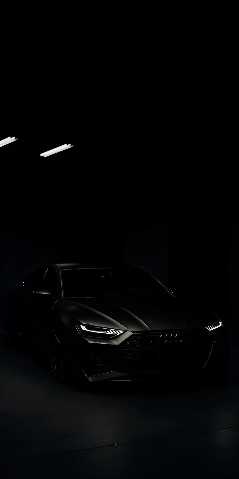 Download this stunning Audi RS7 wallpaper for your iPhone, featuring a sleek, all-black design in crisp 4K resolution. The wallpaper showcases the car's illuminated headlights and distinctive grill.