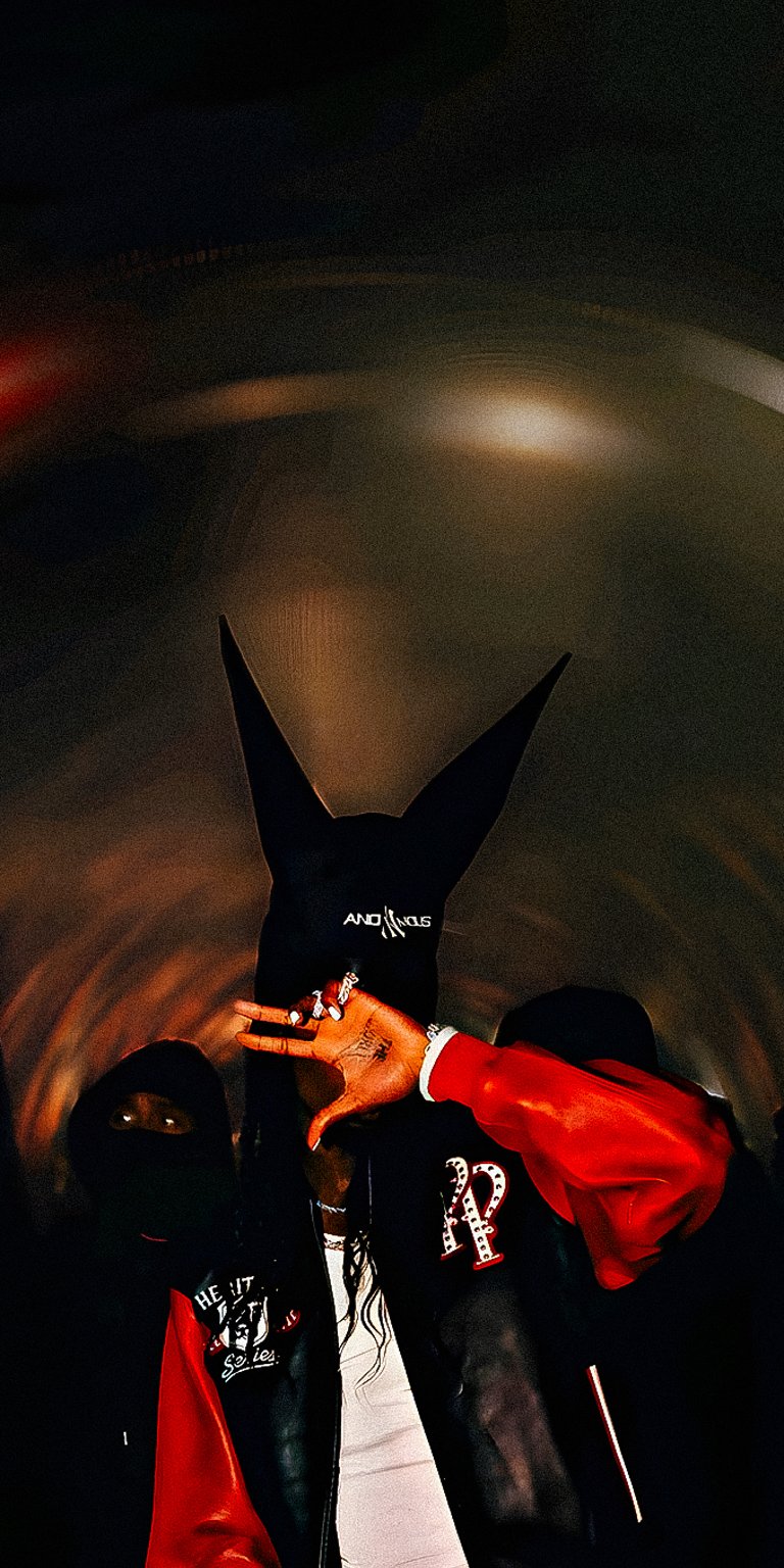 Carti outfit wearing black cap with long standing ears and a varsity jacket wallpaper