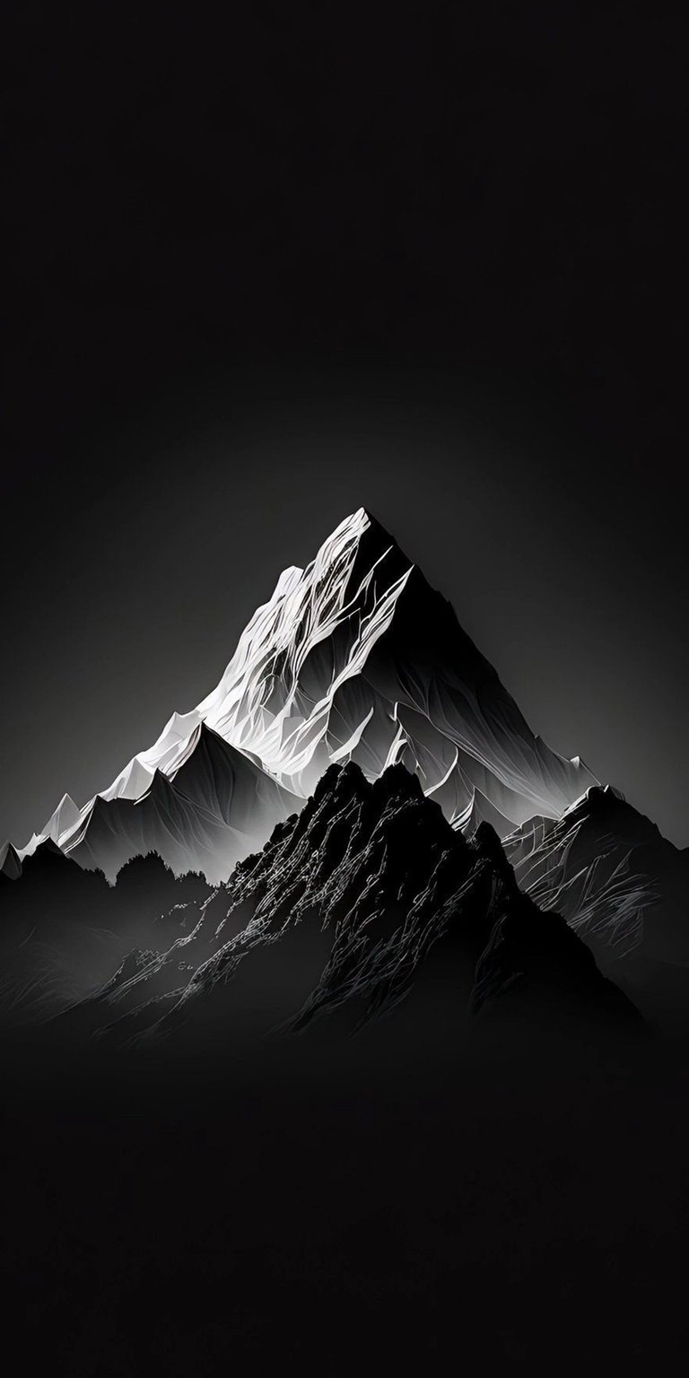 This breathtaking mountain wallpaper in 4K resolution is perfect for your iPhone. The stark black and white contrasts highlight the jagged peaks and textured rock faces.