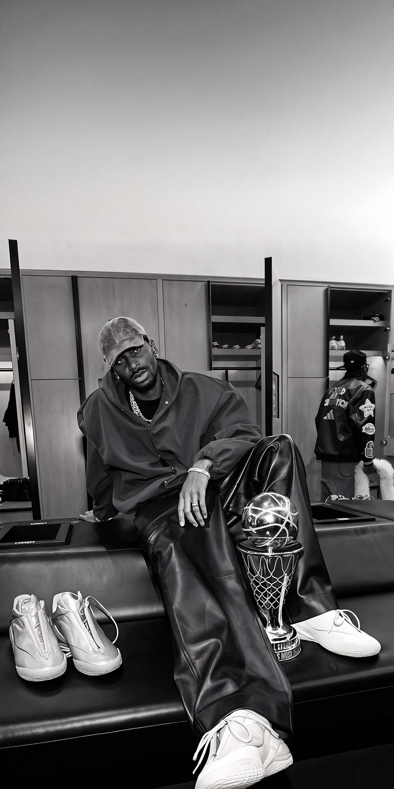Shai Gilgeous-Alexander with the trophies wallpaper iPhone