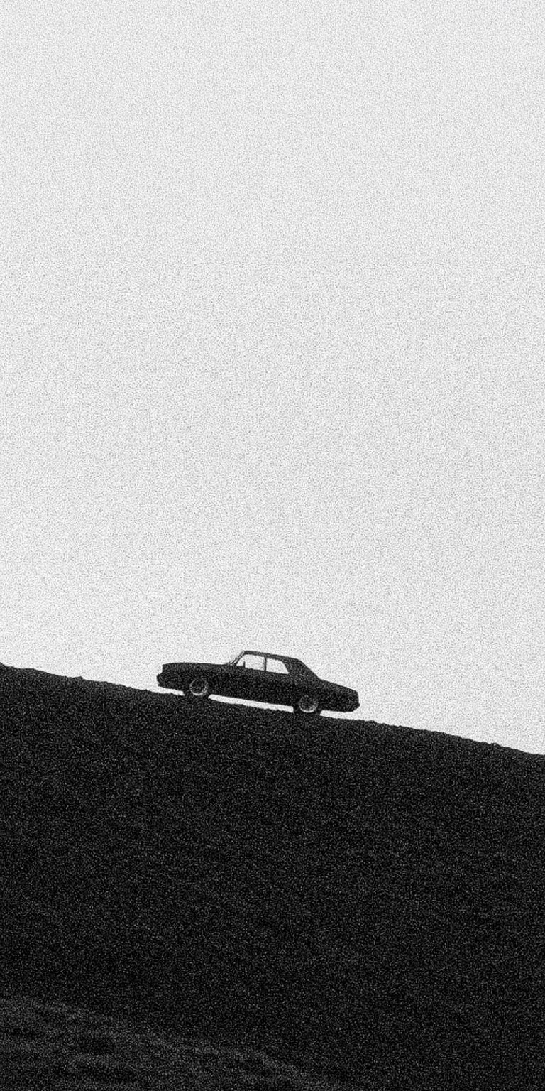 Old Car Climbing Mountain Wallpaper for Phone