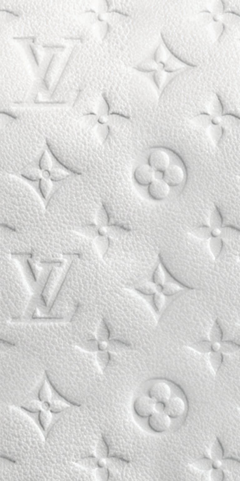 This premium white embossed leather wallpaper features a clean, minimalist 4K texture for a sophisticated look. Elevate your iPhone display with this crisp leather wallpaper showcasing deep-set luxury branding.