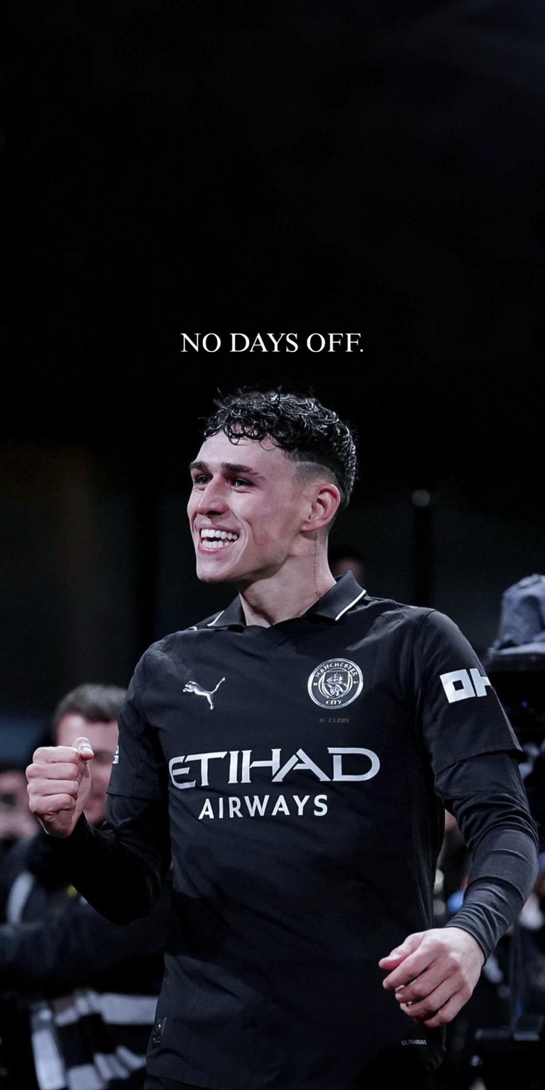 A sleek, moody 4K wallpaper featuring Manchester City and England star Phil Foden in his dark training kit. The photo is captioned with the concise and powerful motivational quote: "NO DAYS OFF." A great design emphasizing dedication and commitment.
