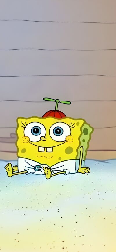 This adorable Spongebob and Patrick 4K wallpaper is perfect for your iPhone. This matching wallpaper features baby Spongebob and Patrick sitting on sand with cute baby hats and diapers.