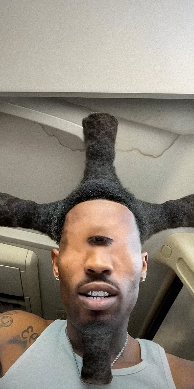 Man with one eye and funny hair wallpaper