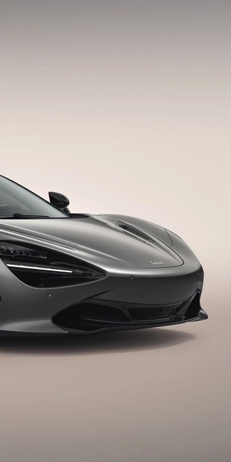 This iPhone wallpaper features a sleek, gray McLaren in 4K. The car's aerodynamic lines and low front splitter create a striking wallpaper.