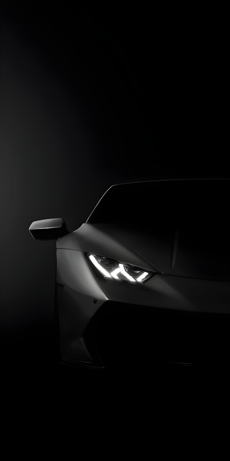 Lamborghini Front AMOLED wallpaper with sharp LED headlights glowing in deep shadows and a bold supercar stance. This OLED / AMOLED wallpaper delivers dramatic contrast for your iPhone lock screen and home screen.