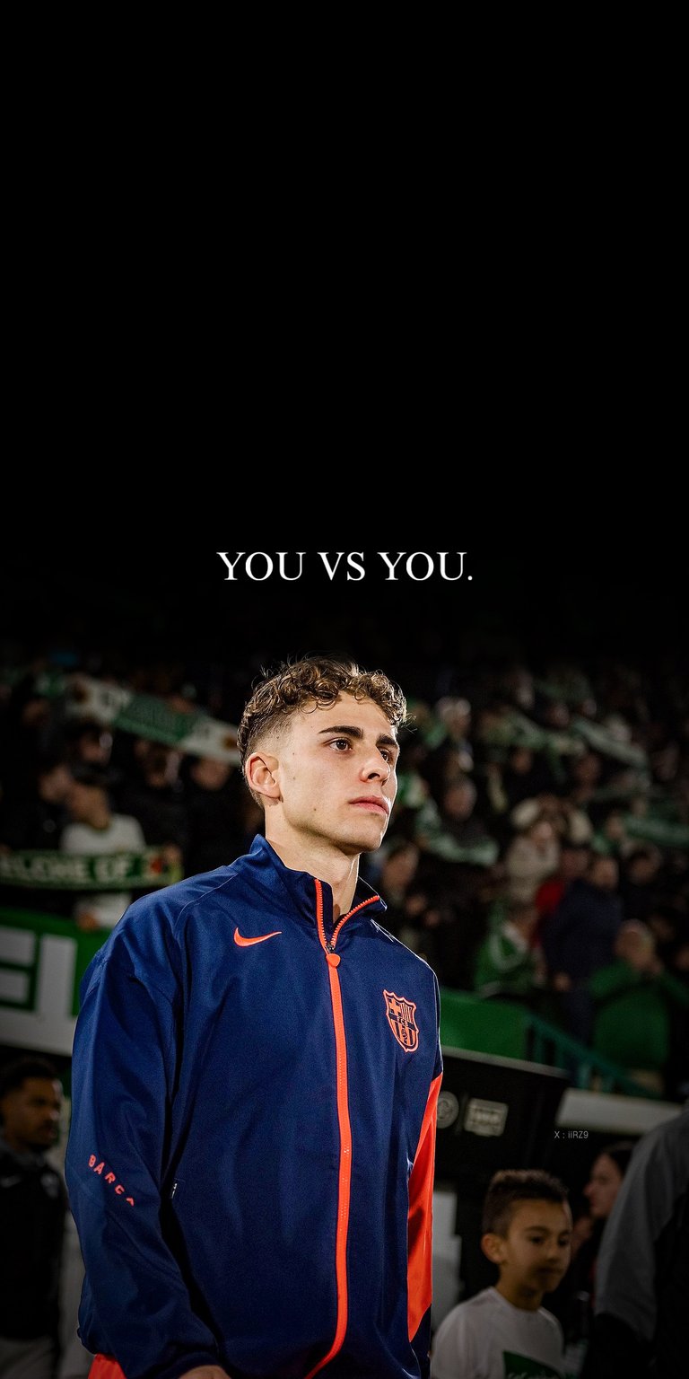 This high-contrast 4K wallpaper features Fermín López in his FC Barcelona training gear against a deep black background. Optimized for OLED / AMOLED wallpapers on iPhone, the image captures a cinematic pre-match mood with vibrant blue and red accents.