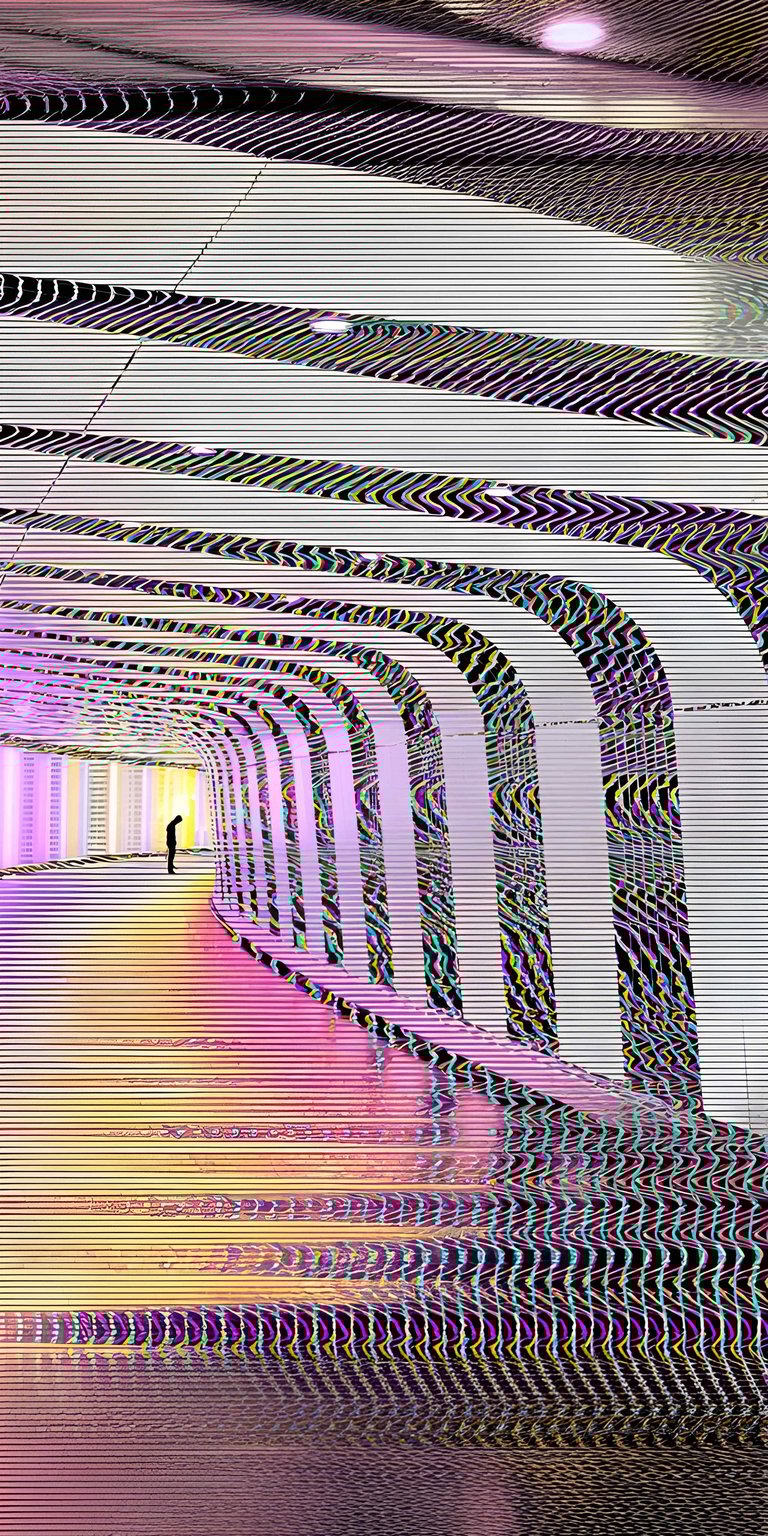 Download this Hallway 4K wallpaper for your iPhone, showcasing the person silhouetted at the end of the hallway. The wallpaper features a spectrum of colors on the floor and a unique striped ceiling design.