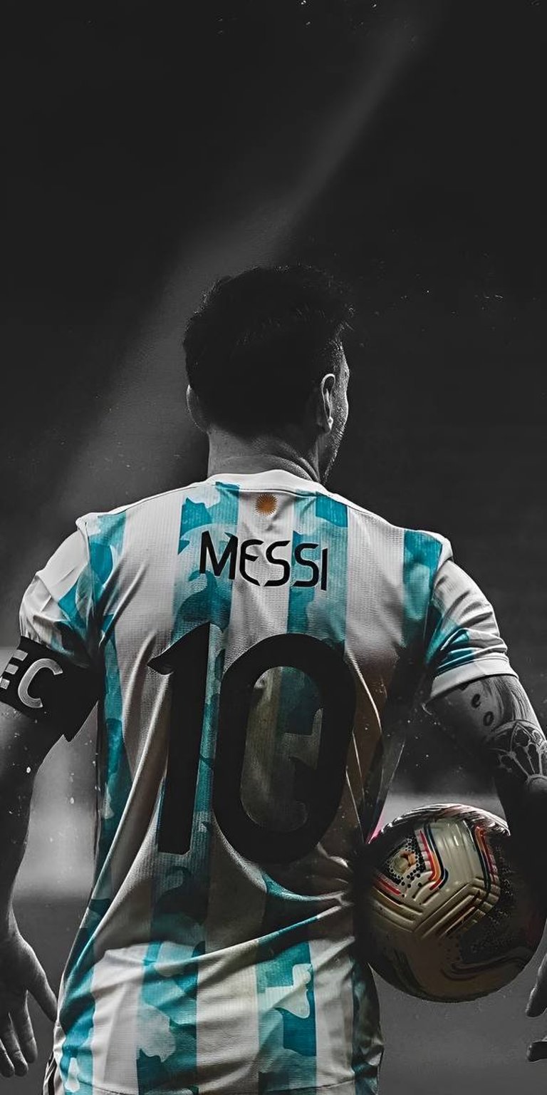 Lionel Messi on the field wallpaper for mobile