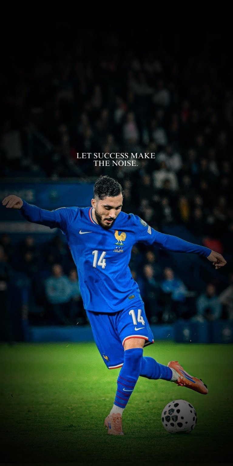 This soccer player in the image is Rayan Cherki, an attacking midfielder and winger for the France national team.