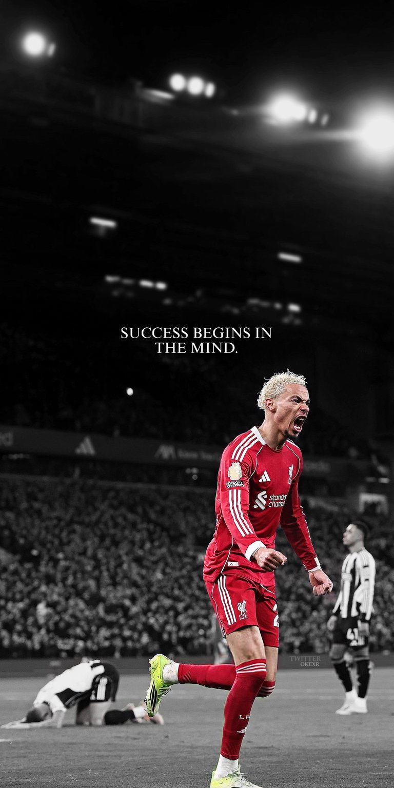 This Hugo Ekitiké 4K wallpaper features the striker in a bold Eintracht Frankfurt kit, set against a dramatic monochrome stadium crowd. Designed for iPhone, this aesthetic wallpaper utilizes high-contrast selective color to highlight the intensity of the goal celebration.