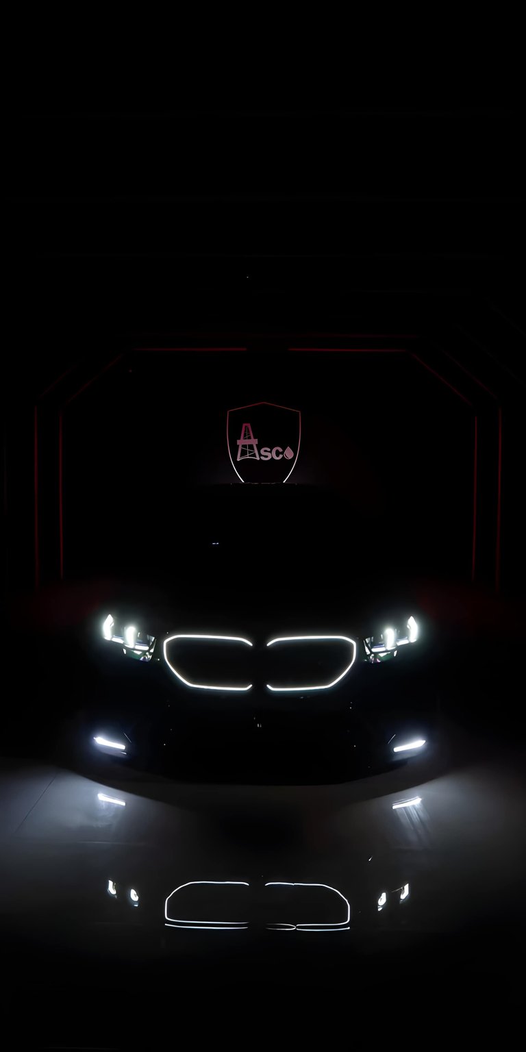Download this stunning BMW 4K wallpaper for your iPhone and admire its illuminated grille and headlights. The crisp reflection of the car further enhances this high-resolution wallpaper.