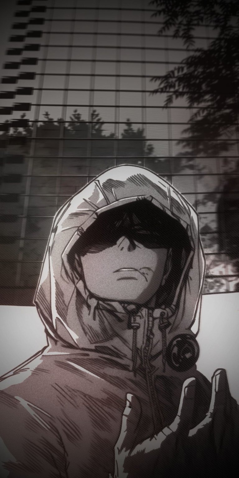 Download this striking Yuji Itadori 4K wallpaper for your iPhone today and enjoy this high-definition wallpaper. The image features Megumi wearing a hooded jacket and standing in front of a building with reflective windows.