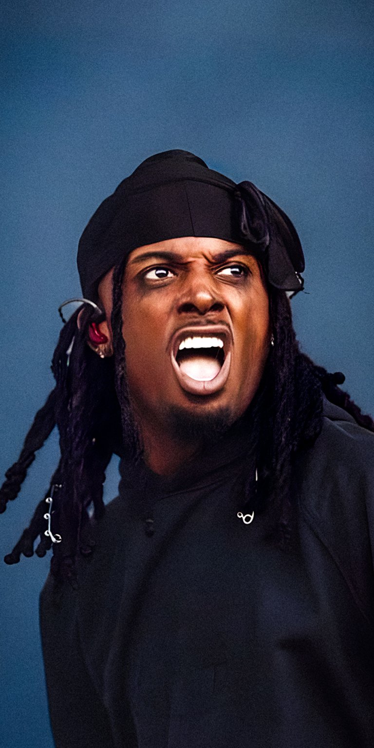 Carti shouting while wearing all black shirt wallpaper