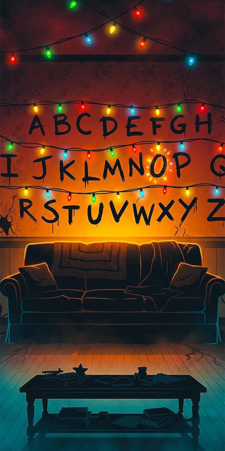 Step into the Upside Down with this high-definition digital wallpaper featuring the iconic Joyce Byers living room. The design showcases the hand-painted alphabet and flickering multi-colored Christmas lights used to communicate with Will. Perfect for fans of the Netflix series seeking a moody, nostalgic, and slightly eerie aesthetic for their device.