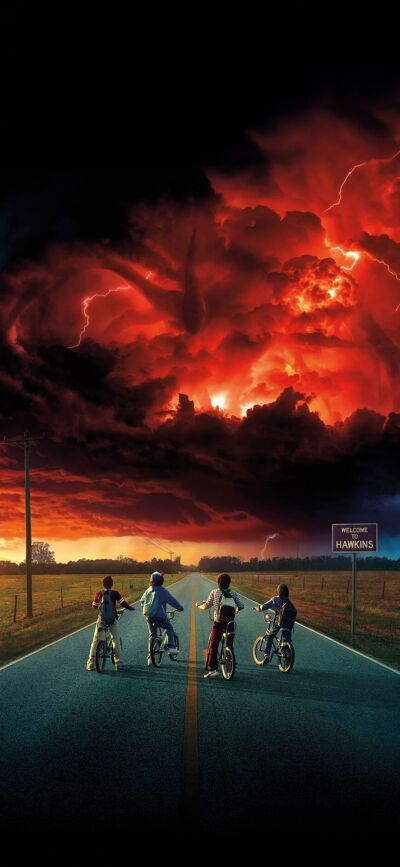 Get this Stranger Things wallpaper in 4K for your iPhone! This matching wallpaper, perfect for two people, features a group of kids riding their bikes down a road, with a welcoming sign of Hawkins and an interesting cloud above.