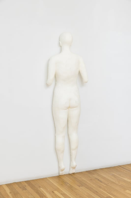 artist in urethane foam on wall