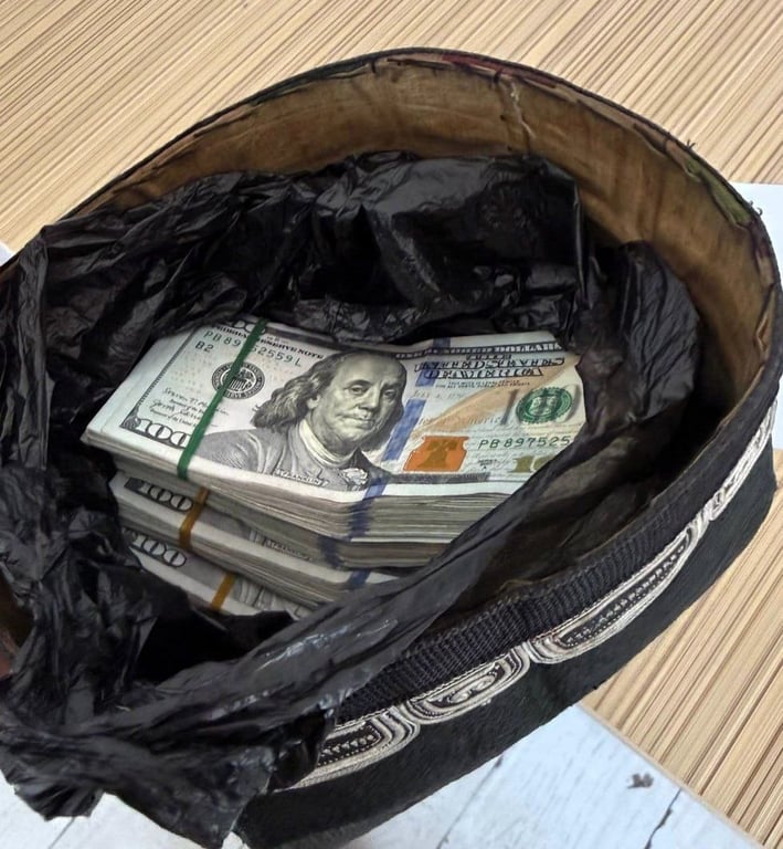 Andijonda erkak $35,6 mingni doʻppiga yashirib olib chiqishga urindi