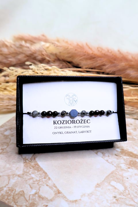 Bransoletka "KOZIOROŻEC" - srebrna - Jasny niebieski