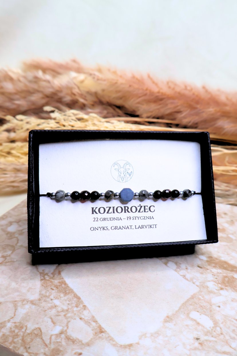 Bransoletka "KOZIOROŻEC" - srebrna - Jasny niebieski