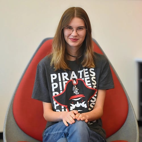 Student wearing a Pirates tee