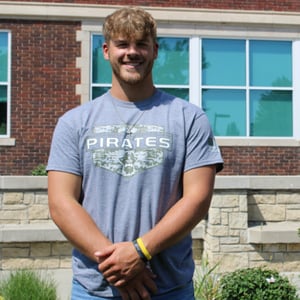 Student wearing a gray Pirates tee