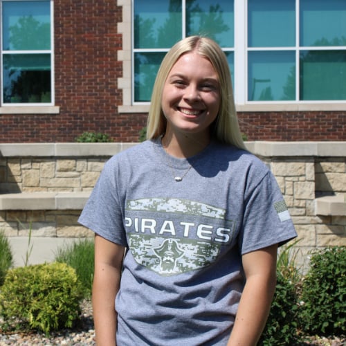 Student in gray tee