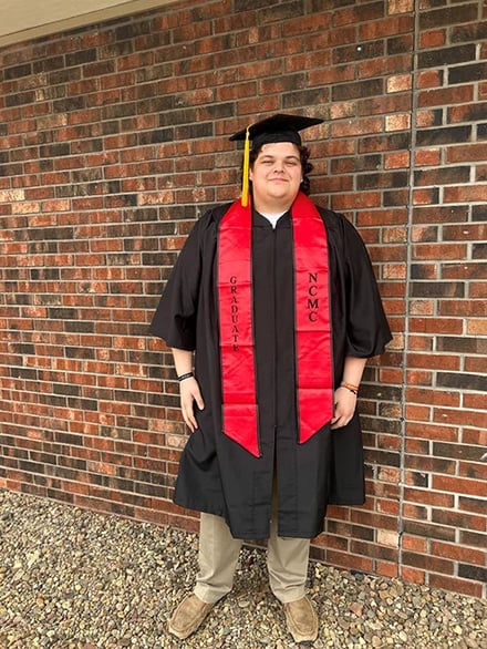 Cole in Commencement attire