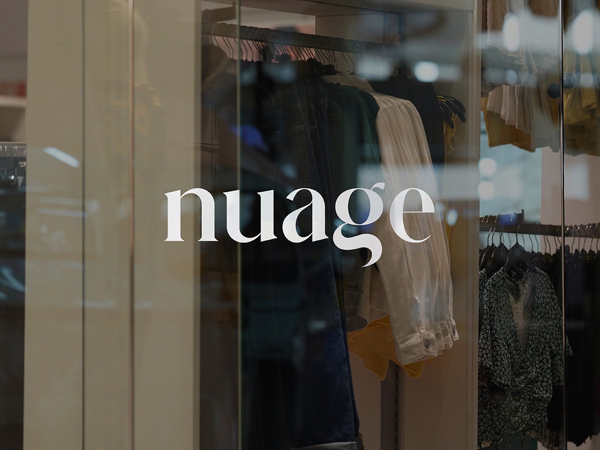 Nuage storefront window with wordmark