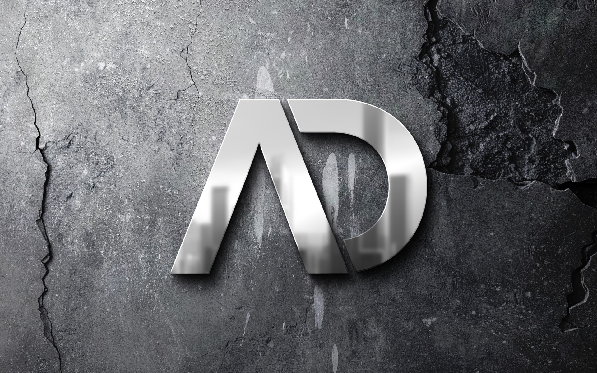 AD Welder logo on concrete wall