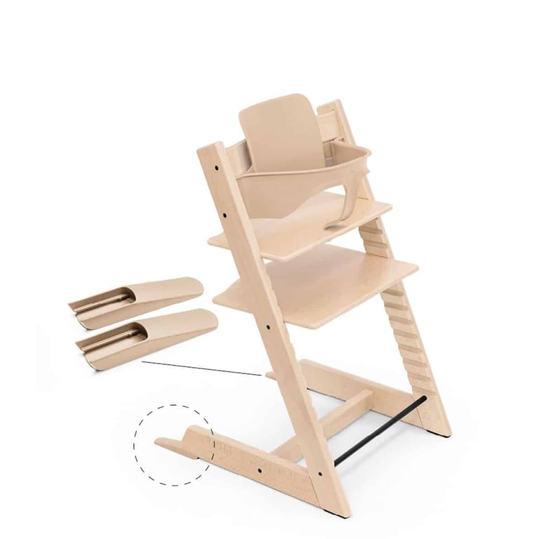 Stokke Tripp Trapp Baby Set V2 in natural, gezeigt mit der Standbeinstütze