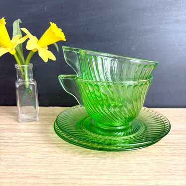 Vintage uranium green swirl glass cups and saucers pair – flat handle teacups 
