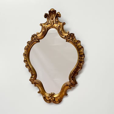 Vintage Framed Gilded Mirror with Ornate Decor 