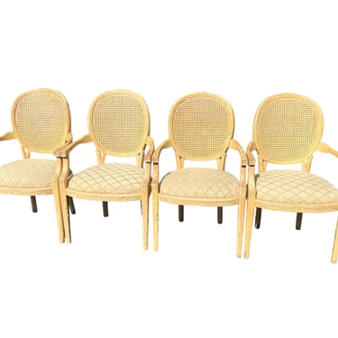 Set of four faux bois dining chairs with cane backs 