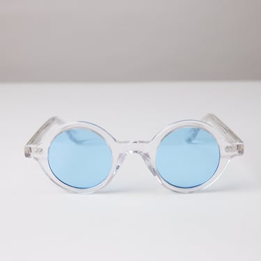 New York Eye_rish, Greystones. Clear Frame with Blue Lenses 