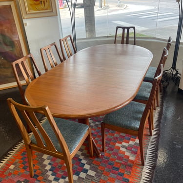 Danish Teak Round to Oval Dining Table by Benny Linden