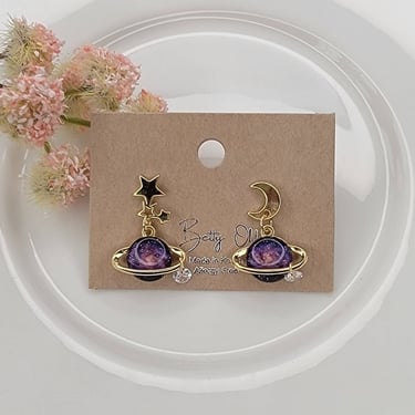 PLANET AND STAR AND MOON DANGLE EARRINGS.
