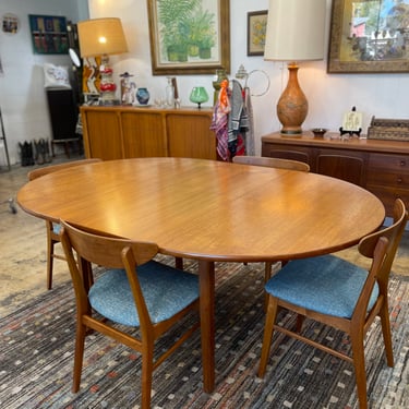 Danish Round to Oval Teak Dining Table with Hidden Butterfly Leaf